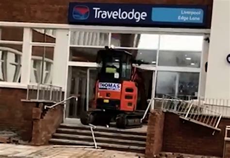 man drives mini digger into travelodge|john manley digger driver.